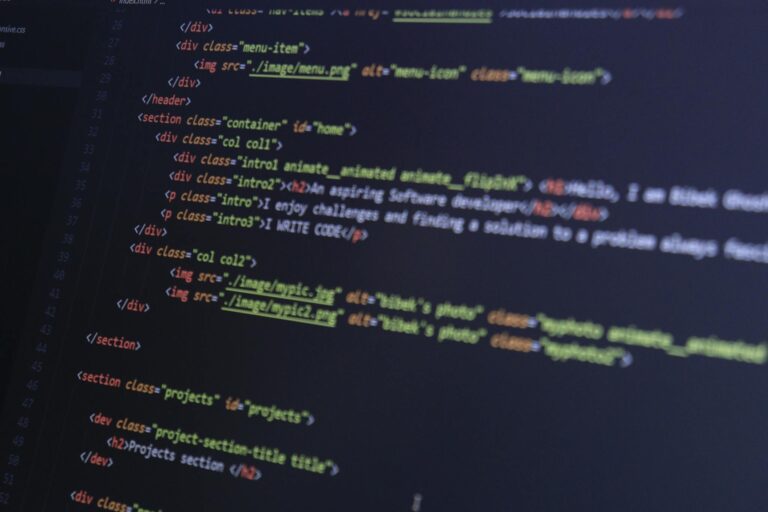 HTML and CSS code on a computer monitor, highlighting web development and programming.